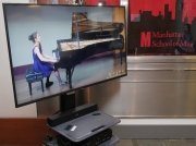 034 Live stream monitor in hallway outside Miller Hall